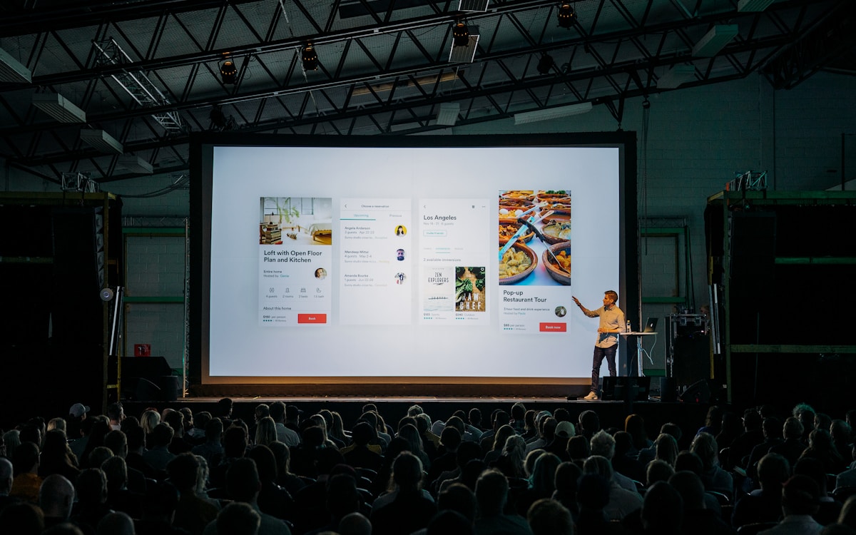 Communications director briefing journalists at a product launch event